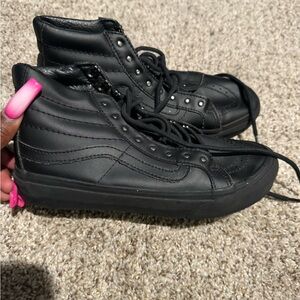 Black leather vans. Cannot fit anymore. Need gone. Size 5 womens. Worn once